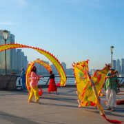 People are practicing ribbon dragon dance in the morning at the Bund in Shanghai, China